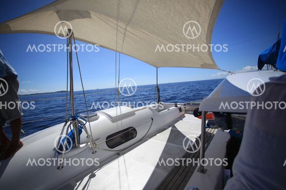 yacht in the middle of the calm blue sea