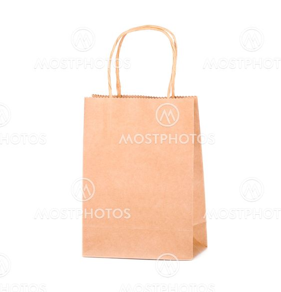 Craft paper bag isolated on white background. Packaging...