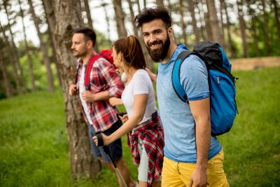 Group of young people are hiking in mountain