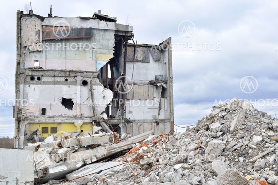 Pieces of Metal and Stone are Crumbling from Demolished Building Floors