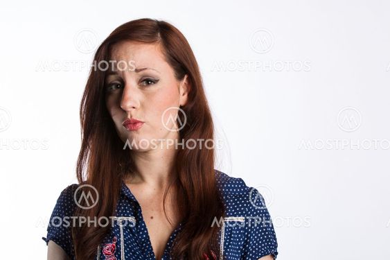 Woman with Red Hair Pierces Lips