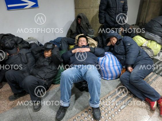 3 Men Sleep at Beijing West Train Station