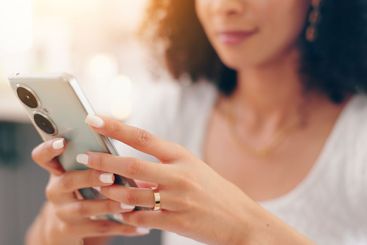 Happy woman, hands and phone typing for social media,...