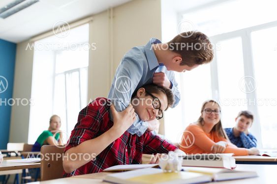 student boy suffering of classmate mockery