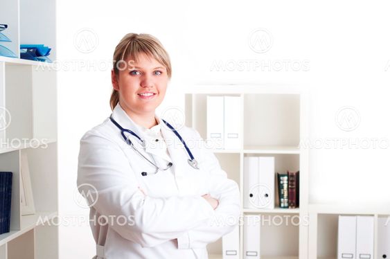 Smiling medical doctor woman with stethoscope.