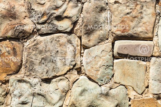 outdoor wall from natural boulders