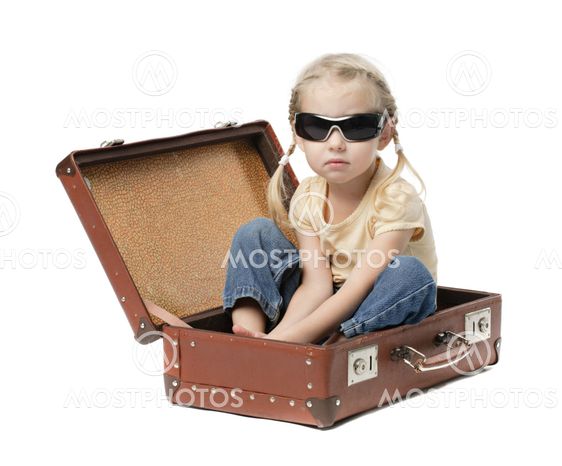 little girl in suitcase