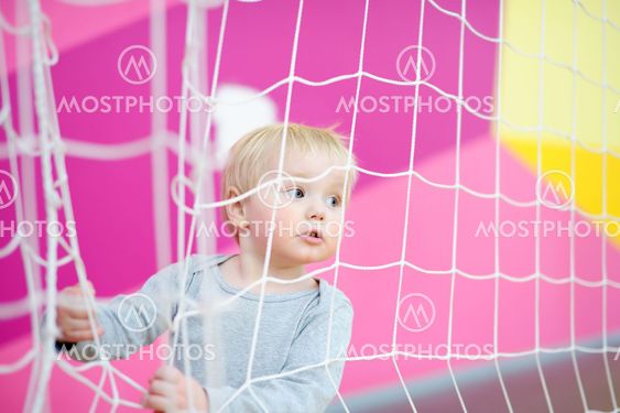 Toddler in indoors sport court