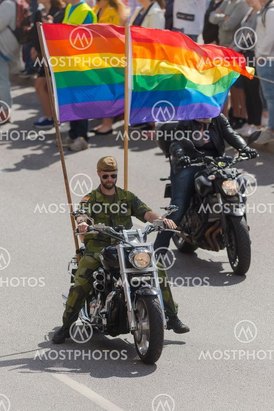 Motorbikes at the pride parade in Stockholm with happy...