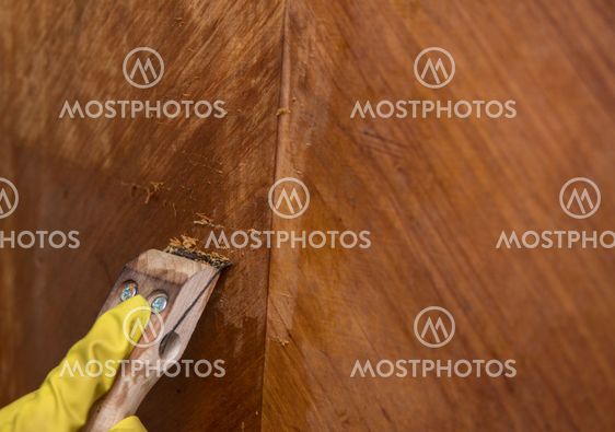 scratching old wax from furnitures