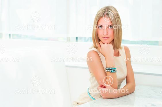 portrait of a beautiful woman in the cafe