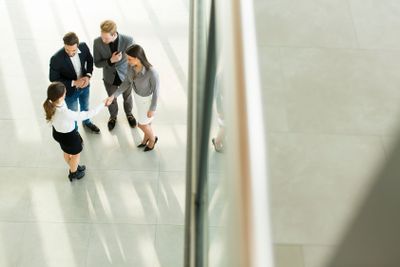 Young people in the office photographed from above