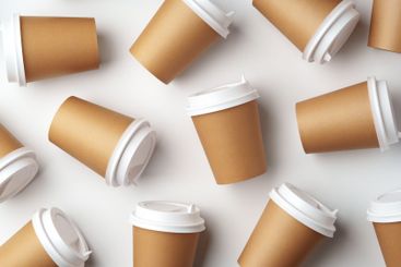 A collection of disposable coffee cups arranged artfully...