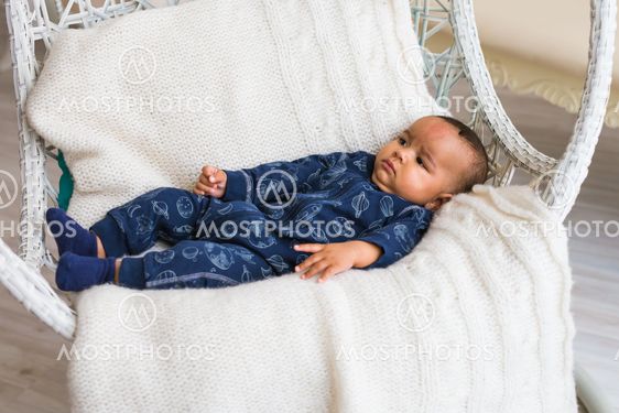 African American Baby Boy Lying