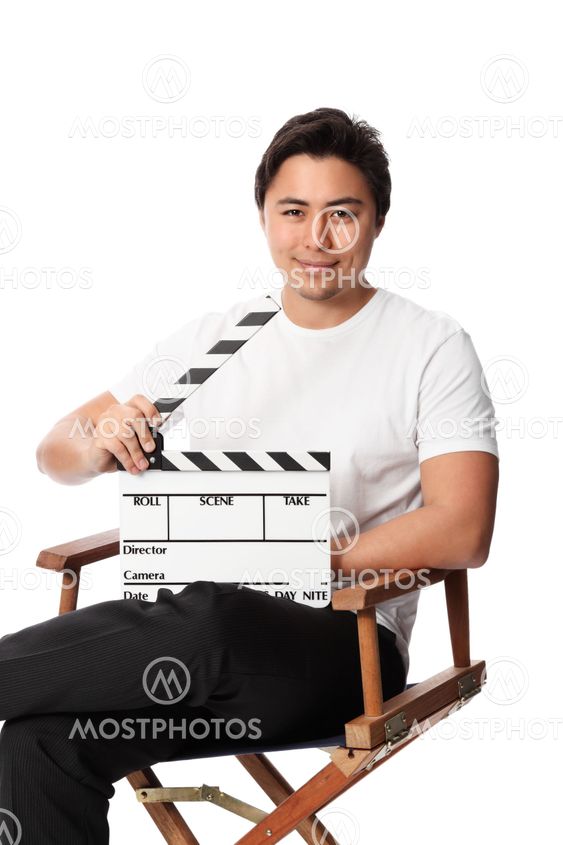 Man holding a film slate