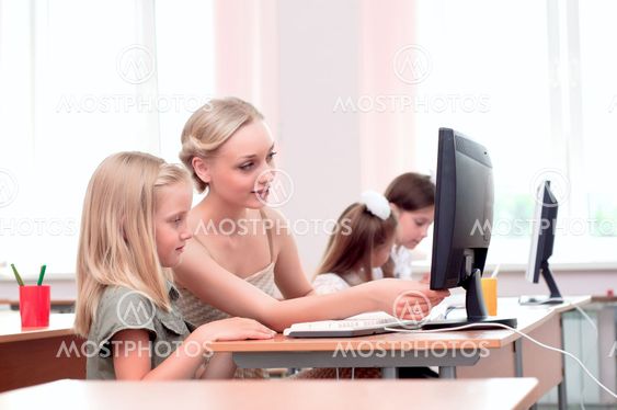 teacher explains the task schoolgirl