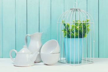 Shabby chic style home decorations on wooden background