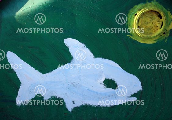 White fish, green barrel