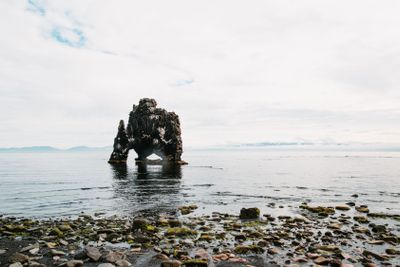 beautiful rock formation in water near icelandic...
