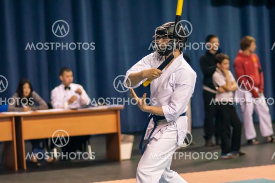 Kobudo competition men with nunchaku