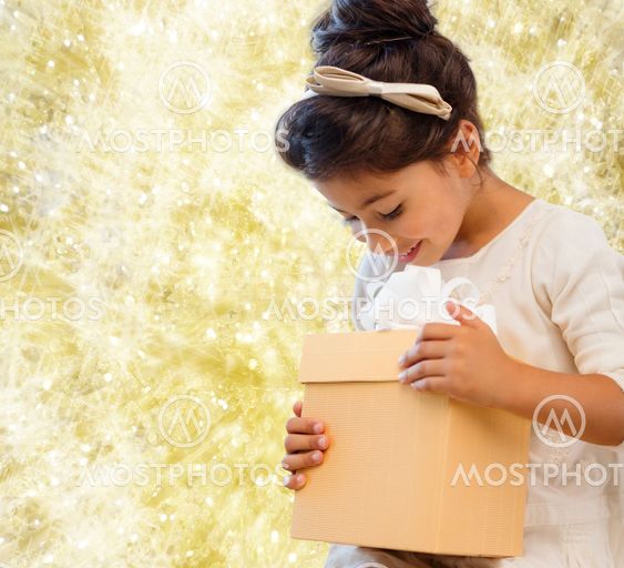 smiling little girl with gift box