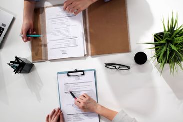 female recruitment consultant meets with a potential hire