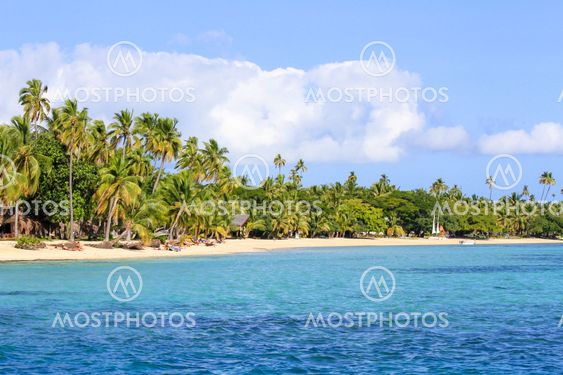 Beautiful Fiji atoll island with white beach