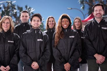 Security Guard at Event Service Leading His Diverse