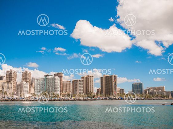 HONOLULU, HAWAII - FEB 2: View of Waikiki Yacht club from Ala Moana beach park with buildings behind