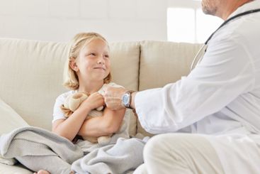 Child, pediatrician and doctor in home for wellness, joy...