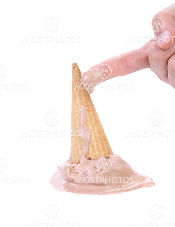 Chocolate ice cream cone fallen and finger.