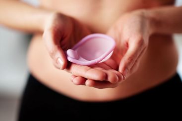 Female Holding Contraceptive Diaphragm Vaginal Ring