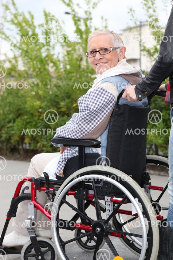 Elderly woman in wheelchair