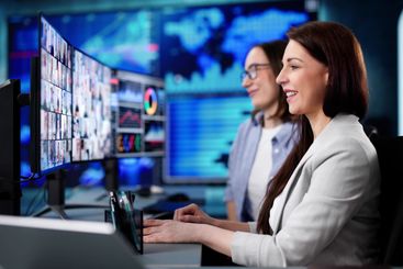 Young Caucasian woman managing virtual teams