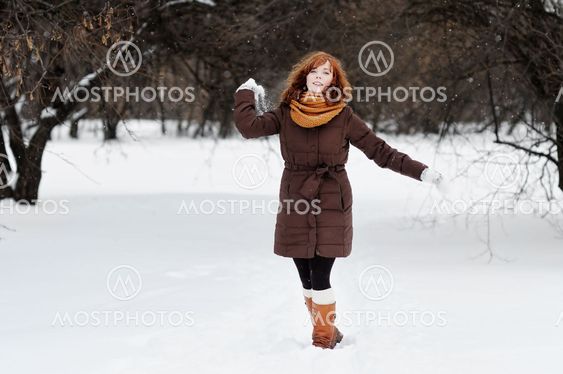 Young woman in winter park