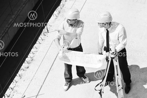 Team of architects on construciton site