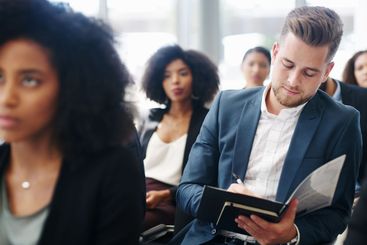 Writing, audience and seminar with business man at...