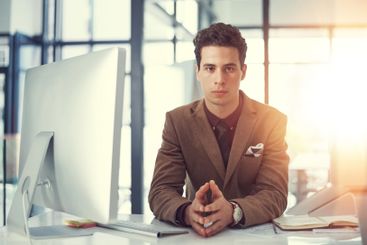 Portrait, computer and serious with business man in...
