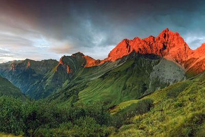 Amazing sunset and red afterglow in high mountains.
