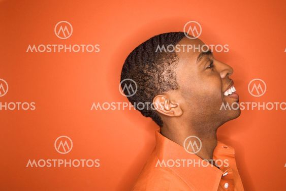 Young man smilng.
