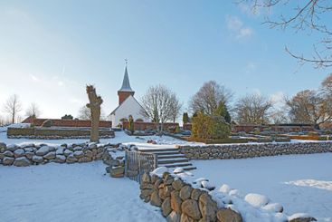 Snow, garden and estate with gate, rocks or blue sky in...