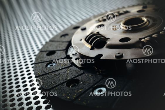 Car clutch on a metal surface