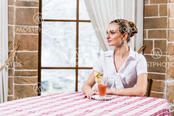 portrait of a nice lady in a restaurant