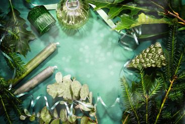 Candles, evergreen twigs, ribbon and Christmas...