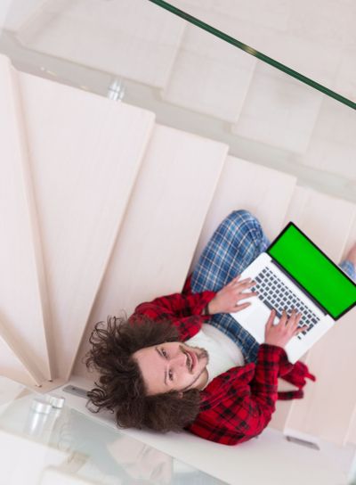 freelancer in bathrobe working from home