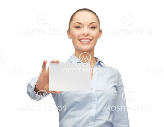 smiling businesswoman showing white blank card