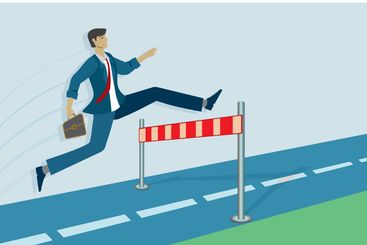 Man jumping over obstacle on road forward.