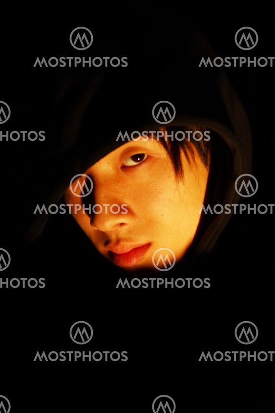 Monochrome picture of a guy in a hood