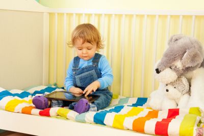 Boy playing with tablet pc