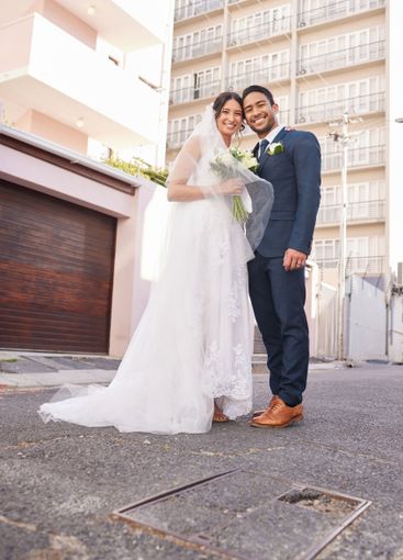 City, wedding and portrait of bride and groom together...
